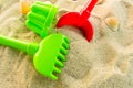 A multi-colored set of children`s toys for the summer games in the sandbox or on the sandy beach. The concept of  holidays Royalty Free Stock Photo