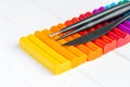 Multi-colored set of plasticine with stacks on a white background. Royalty Free Stock Photo