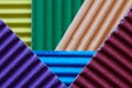 Multi-colored sheets of craft corrugated colored paper or cardboard. The concept of creativity and paper crafts. Geometry. Macro. Royalty Free Stock Photo