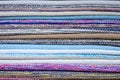 Multi colored soft mats lying in one pile in modern shop Royalty Free Stock Photo