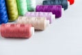Multi-colored spools of sewing threads close-up. Craft and hobby concept Royalty Free Stock Photo