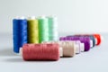 Multi-colored spools of sewing threads close-up. Craft and hobby concept Royalty Free Stock Photo