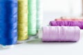 Multi-colored spools of sewing threads close-up. Craft and hobby concept Royalty Free Stock Photo