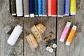 Multi-colored spools of thread, measuring tape and buttons Royalty Free Stock Photo