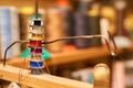 Multi colored spools of thread for a sewing machine in a tailor's workshop Royalty Free Stock Photo