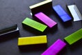 Multi-colored stapler staples on a black background Royalty Free Stock Photo