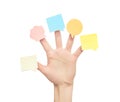 Multi-colored stickers on fingers of the hand. Royalty Free Stock Photo
