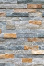 Multi-colored stone wall, showcasing the texture and detail of the masonry work. Royalty Free Stock Photo