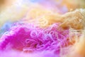 Multi-colored tangled threads abstract texture pattern background. Macro shot of colorful needlecraft silk thread ropes Royalty Free Stock Photo