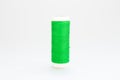 Green threads for sewing on a white background Royalty Free Stock Photo