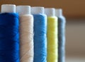 multi-colored threads on spools close-up Royalty Free Stock Photo