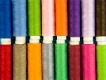 Multi-colored threads in spools, sewing