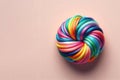 Multi-colored threads twisted into one ball on a clean background. Space for text. Royalty Free Stock Photo