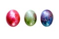 Multi-colored three marble eggs for Easter on a white background, isolate, horizontal