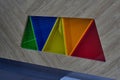 Multi-colored triangles of plastic shelves fence of the