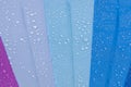 multi-colored umbrella with water drops Royalty Free Stock Photo