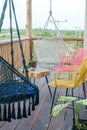 Multi-colored wicker chairs on the balcony, mexico Royalty Free Stock Photo