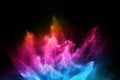 Multi colour powder explosion on black background. Launched colourful dust particles splashing Royalty Free Stock Photo