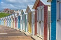 Multi coloured beach huts facing the beach at Bude, Cornwall UK July 6 2020 Royalty Free Stock Photo