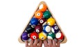 Multi coloured billiard balls in the form of a triangle with numbers shoot from top view. Man`s hands with white billiard balls Royalty Free Stock Photo