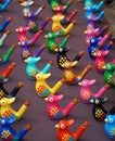 Multi Coloured Bird Whistles on table. Royalty Free Stock Photo
