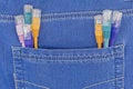 Multi coloured ethernet network cables in blue jeans pocket Royalty Free Stock Photo