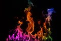 Multi-coloured Fire on a black background.