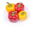 Multi-coloured pepper on a plate Royalty Free Stock Photo