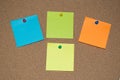 Multi Coloured Post it Notes on a Cork Board Royalty Free Stock Photo