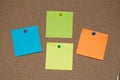 Multi Coloured Post it Notes on a Cork Board Royalty Free Stock Photo