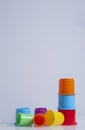 Multi-coloured stacking cups for a baby.balance concept Royalty Free Stock Photo