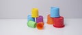 Multi-coloured stacking cups for a baby.balance concept Royalty Free Stock Photo