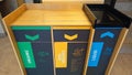 Multi-compartment recycling stations are designed to separate different types of waste. Royalty Free Stock Photo