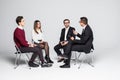 Multi-Cultural Office Staff Sitting Having Meeting Together and discuss. Team building. Royalty Free Stock Photo