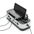 Multi-device charging station with a sleek, rectangular design holds smartphones and Royalty Free Stock Photo