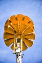 Multi directional yellow round amplified emergency siren