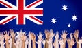 Multi-Ethnic Arms Raised and Australian Flag Background