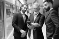 Multi ethnic bearded businessmen together around the city Royalty Free Stock Photo