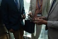 Multi-ethnic business colleague discussing over the digital tablet in elevator Royalty Free Stock Photo