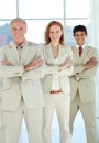 Multi-ethnic business people with folded arms Royalty Free Stock Photo