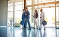 Multi ethnic business people on the way in building Royalty Free Stock Photo