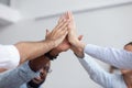 Multi ethnic business team give high five together, close up