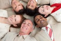 Multi-ethnic business team lying in a circle