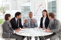 Multi-ethnic business team working together in a m Royalty Free Stock Photo