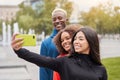 Multi ethnic friends outdoor. Diverse group people Afro american asian spending time together Royalty Free Stock Photo