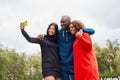 Multi ethnic friends outdoor. Diverse group people Afro american asian spending time together Royalty Free Stock Photo