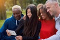 Multi ethnic friends outdoor. Diverse group people Afro american asian spending time together Royalty Free Stock Photo