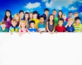 Multi-Ethnic Group of Children Holding Billboard Concept Royalty Free Stock Photo