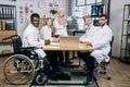 Multi ethnic group of doctors having conference at office Royalty Free Stock Photo