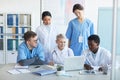 Multi-Ethnic Group of Doctors Working Together Royalty Free Stock Photo